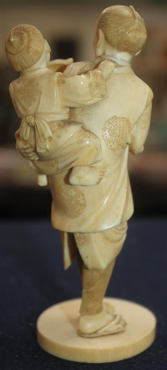 A Japanese ivory okimono, Meiji period, 12.5cm